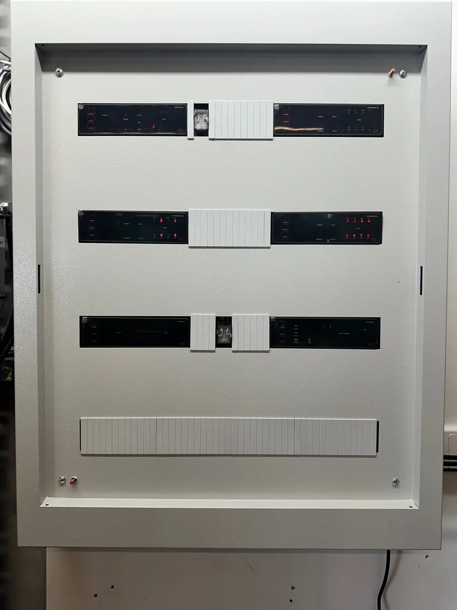 A fitted ICT Protege GX controller and reader expander panel at the Docklands site