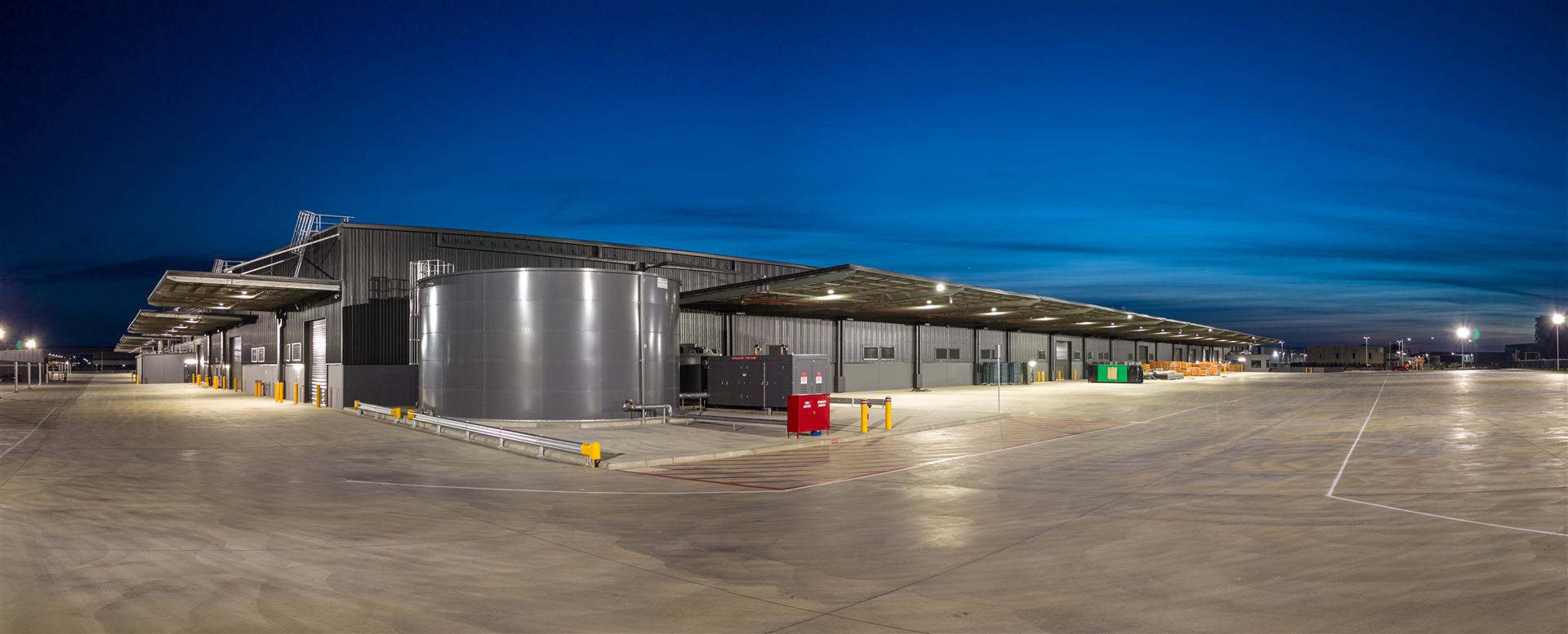 The Walkinshaw Group campus loading apron at dusk