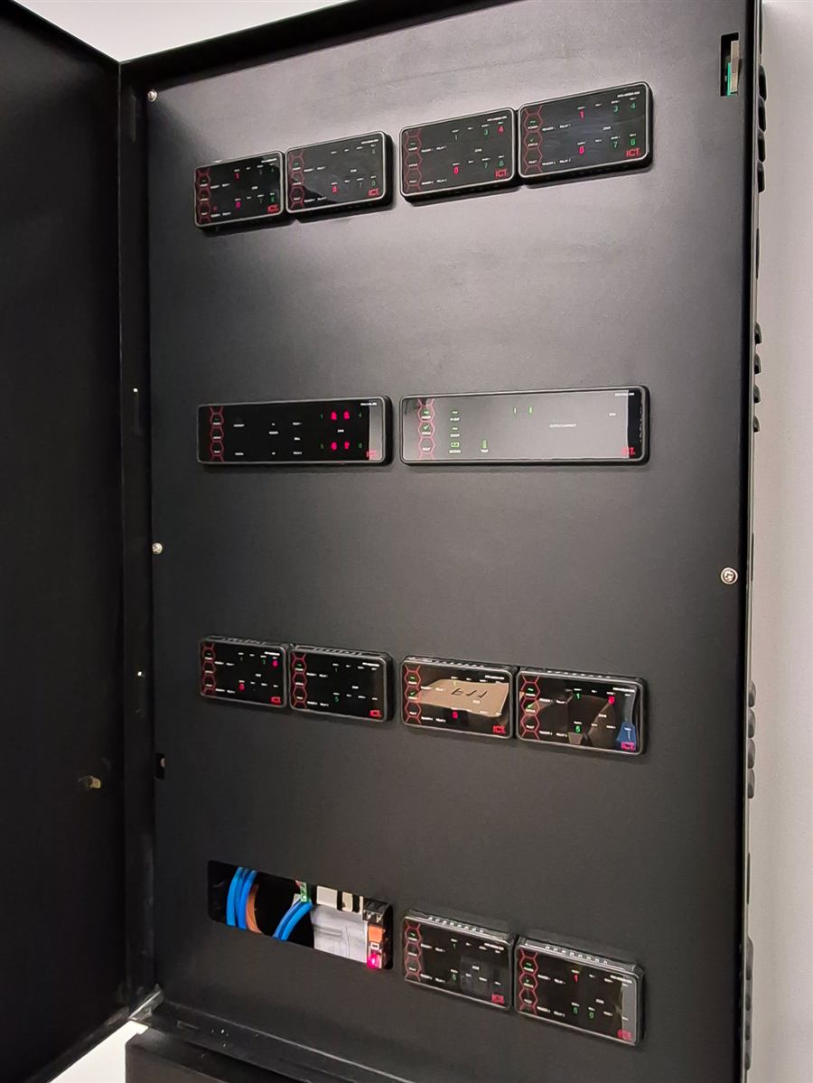 ICT Protege GX controller and expander modules inside a site panel